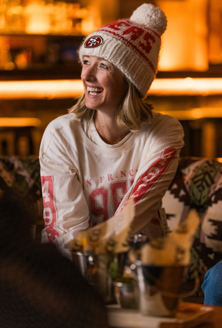 The 49ers NFL Beanie with Faux Fur Pom